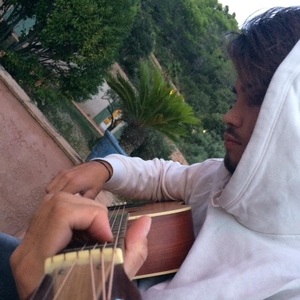 Axel - Prof de guitare - Signes